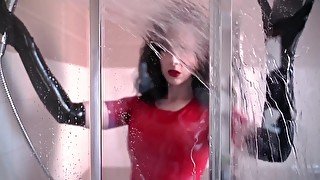 Shower in latex red dress