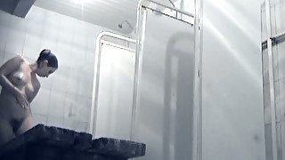 Lovely young white ladies in the shower room filmed naked