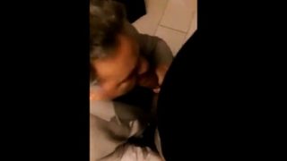 Suited dad blows in public toilet