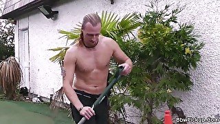 Chubby girl in lingerie seduces garden worker