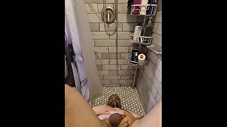 Caged slave drinks his own piss in the shower at Sir's request