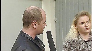 German blonde interviewed outdoors