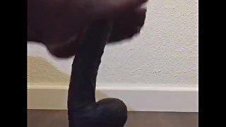 Jerking off dildo playing with cum