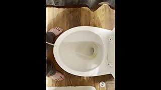 Master Justin Pisses in Toilet