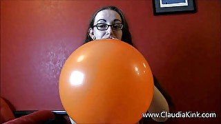 Blowing up and playing with a huge balloon