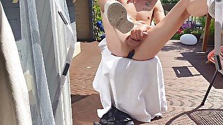 Fun in the sun. Lad outdoor with dildo.