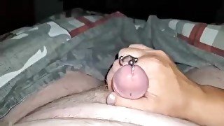 MILF gives cock with Prince Albert a hand job