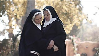 Lesbian nuns get freaky with each other outdoors