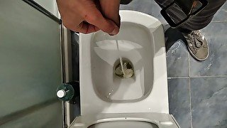 Big Cock Pisses in the Bathroom and then Jerks Off with Massage Body Oil