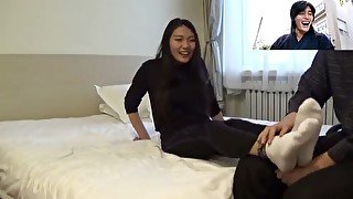 chinese girl tickling with white socks