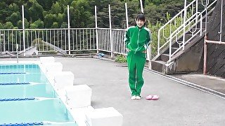 Japanese girl swim in pool with yellow swimsuit soft