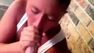 Streetwhore swallows on stairs