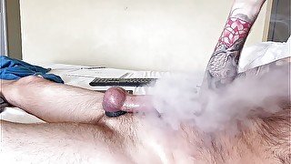 Hot tattooed Richard RiXXX stroking big cock blowing clouds