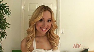 Beautiful blonde babe Lucy Tyler strips down and uses her vibrator on her clit to orgasm