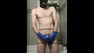 Rubber Boy Jerking Off in Sheath Shorts