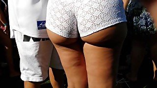 Candid Juicyy thick Latina in white shorts!!