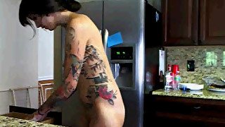 Naked Tattoo Slut Cleans Kitchen.