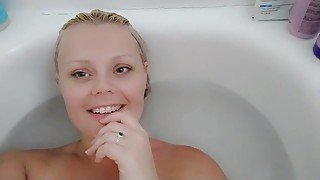 Good girl gets a facial from Daddy in the bathtub