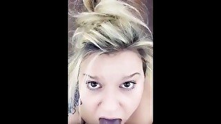 Blonde sucking and gagging big dildo