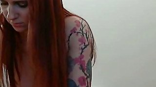 Young tattooed redhead webcam babe shows me off her tits and pussy