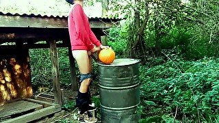 Twink is hard fucking a pumpkin in the garden