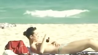 Spy at the topless beach films the boobs of sexy girls