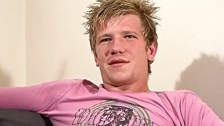 Blonde Brit twink playfully strokes his dick and cums loads