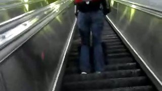 This sexy chick gets on an escalator and has no idea I am spying on her