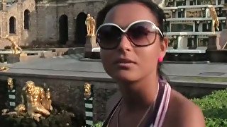 Hot tanned Russian teen Sarah walks around big fountain with her boy