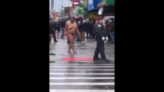 Lady Walks Around Naked Outside On The Corner In Front Of NY