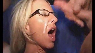 Milf in glasses is soaked in cum