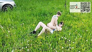 Passionate sex of a young couple in the field