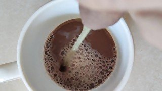 Piss into a cup of chocolate milk