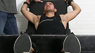 Bound jock giggles while being tickled