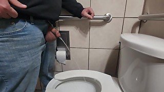 Pissing with huge balls hanging