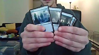 Cute Nerd Open a Pack of Trading Cards