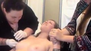 Young Girl gets Nipples Pierced