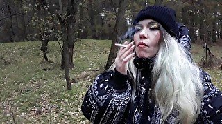 stepsister smokes in the woods before blowjob