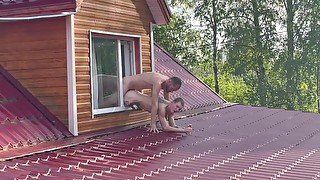 Guy fucks athletic guy in the window of the house overlooking the roof -187