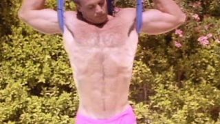 Vintage clip of John Pruitt exercising and showering