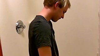 Cute young gay passionately masturbates solo while showering