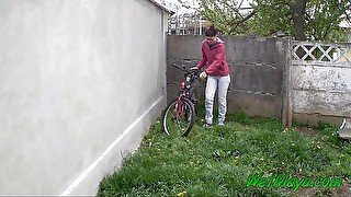 Pissing in the backyard on a cold day, and leaving on her bike