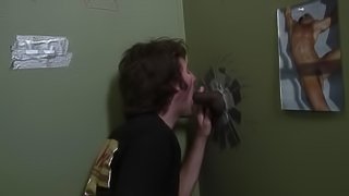 Sinful homosexual sucks a dick through a gloryhole