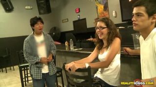 Adorable towheaded lady giving a great blow job in public place