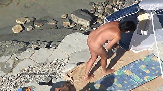 Spy naked girls at the beach shore