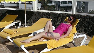 Hot and slutty bikini girl Bea Triss takes sexy poses on the deck chair