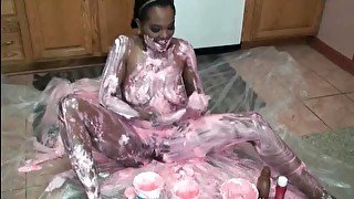 Black girl rubs food all over her naked body