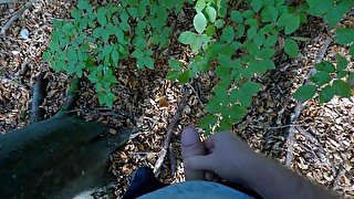 Guy pees in the forest and gets horny and jerks off until he squirts cum in slow motion