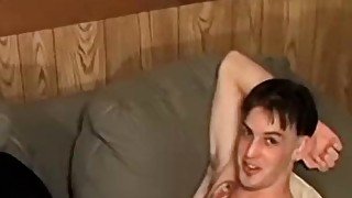 Tattooed twink relaxes by masturbating and cumming wildly