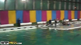 Cute and young brunette babe Natasha is getting seduced by her workmate at dolphinarium for naughty fuck.